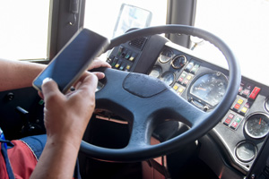 truck driver using smartphone while driving