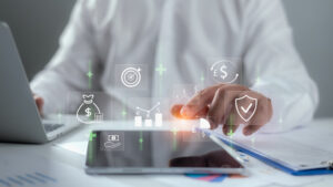 Investment management, Digital banking, Currency exchange, Interest rate, Savings, Financial growth, smart money strategy, Businessman using laptop and tablet with financial icons Representing fintech